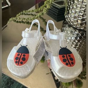 Lady Bug snarls toddler baby girl